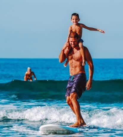 Father and Son Surfing — Insurance Broker in The Entrance, NSW