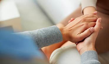 Holding Hands — Insurance Broker on The Central Coast, NSW